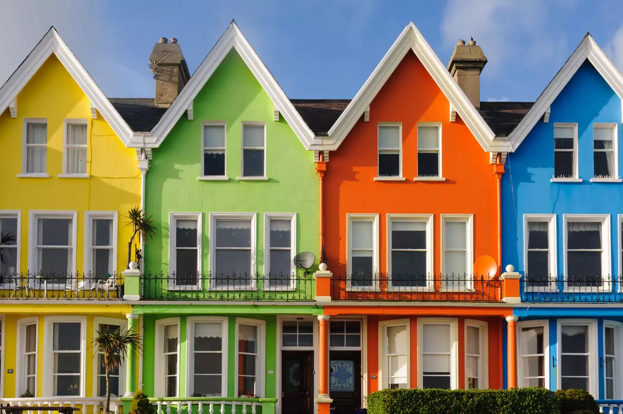 Row of multicolor townhomes
